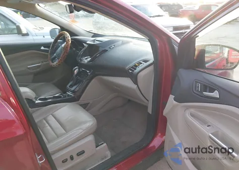 2016 Ford Escape Titanium z USA, uszkodzony, nr VIN 1FMCU0JX7GUC85730